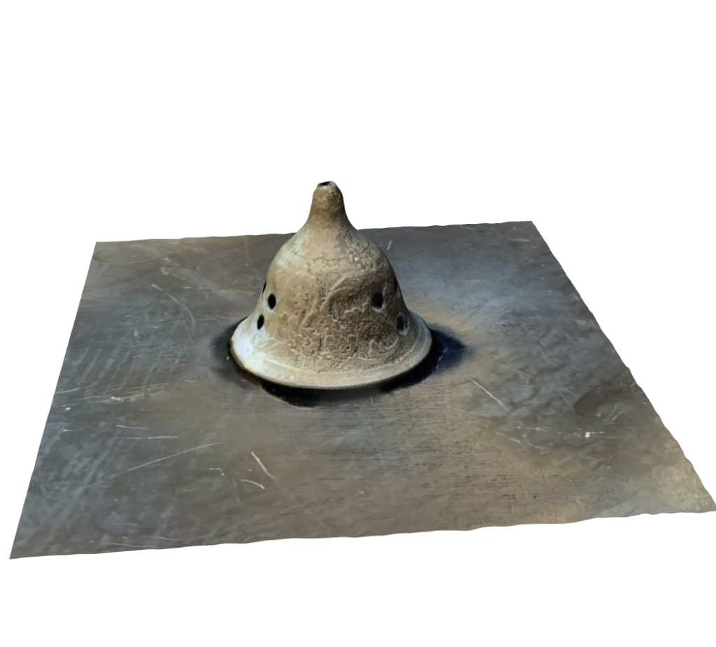 Small metal bell shaped object